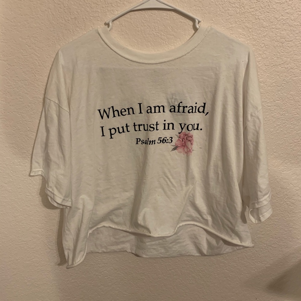 White Bible verse shirt.